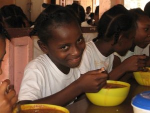 wow.. what else can I say. It was alot of fun to get the kids to smile. This is a young girl at the Maison D'Amor Girls Home during there lunch.